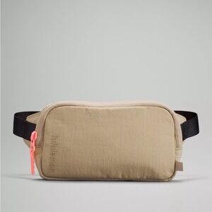 Lululemon belt bag, tan with pink zipper